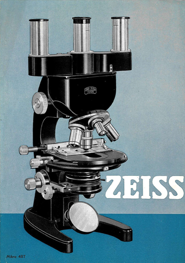 A black and silver microscope
Description automatically generated