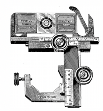 A picture containing text, outdoor, street, camera
Description automatically generated