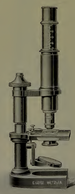 A close-up of a microscope
Description automatically generated with low confidence