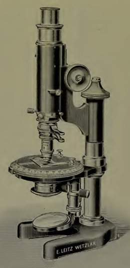 A picture containing indoor, wall, microscope, blender
Description automatically generated