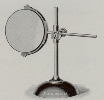 A close-up of a microscope
Description automatically generated with low confidence