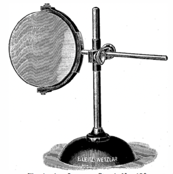 A close-up of a microscope
Description automatically generated with low confidence