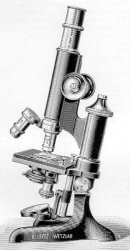 A close-up of a microscope
Description automatically generated with low confidence