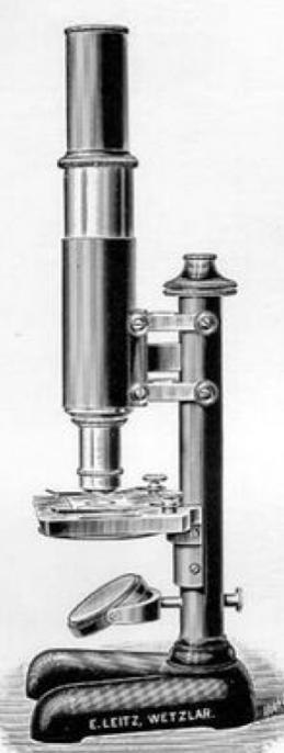 A black and white photo of a machine
Description automatically generated with low confidence