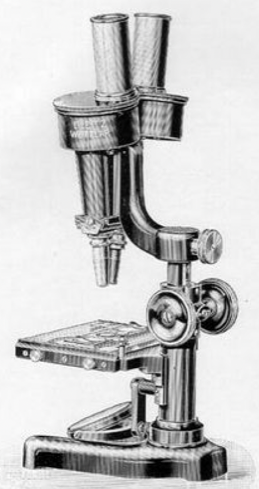 A close-up of a microscope
Description automatically generated