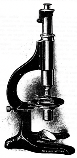 A black and white photo of a machine
Description automatically generated with low confidence