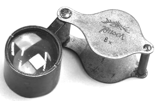 A close-up of a magnifying glass
Description automatically generated