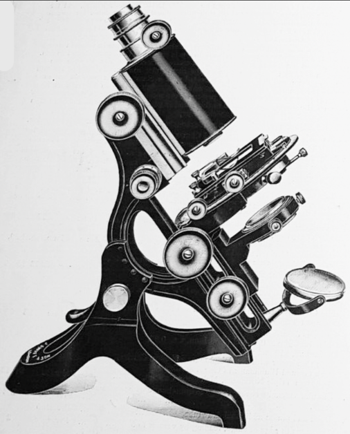 A black and white image of a microscope
Description automatically generated with medium confidence