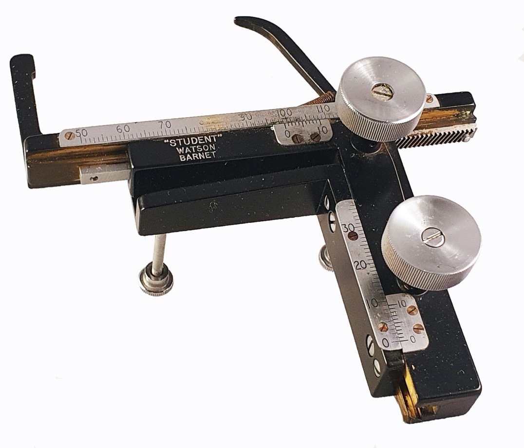 A close-up of a microscopeDescription automatically generated with low ...