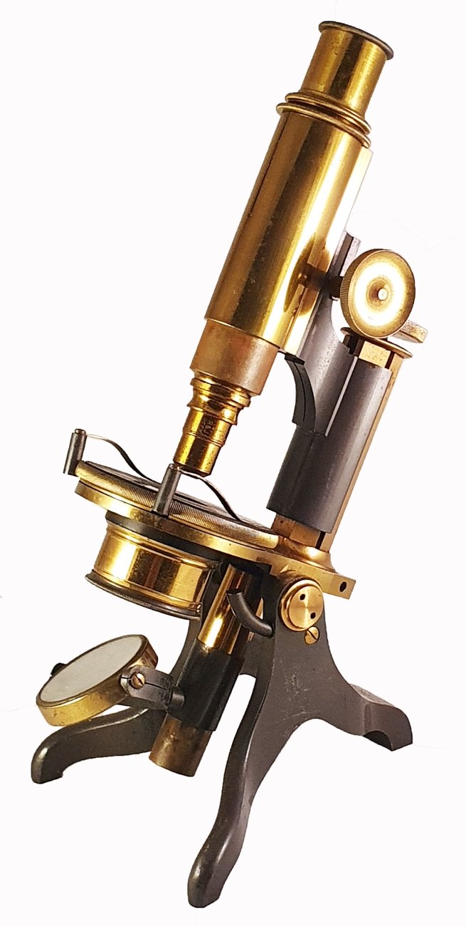Microscope In 1900 A close-up of an objectDescription automatically generated with low ...