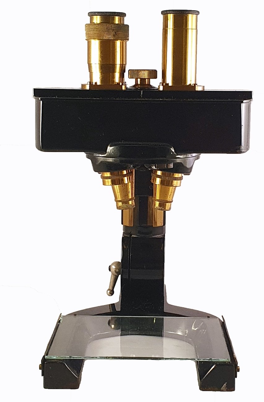 A close-up of a microscopeDescription automatically generated with ...