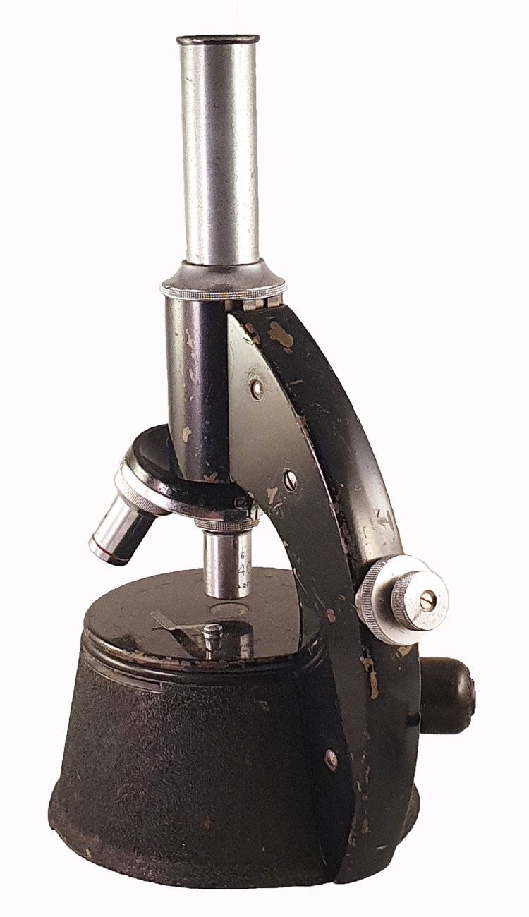 First Backer Microscope A picture containing black, metalDescription automatically generated