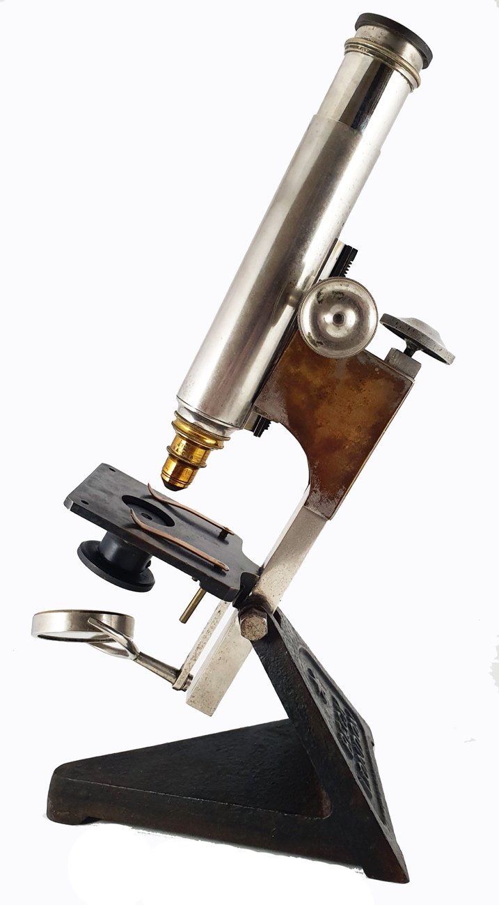 Beck Star Microscope A picture containing table, black, pair, whiteDescription automatically ...