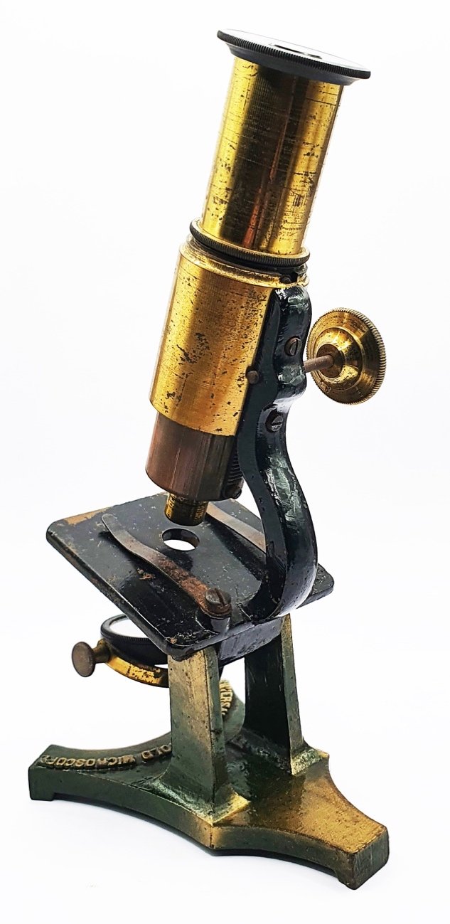 A close-up of a microscopeDescription automatically generated