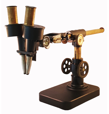 A microscope with a metal tube
Description automatically generated