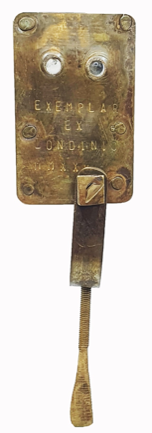 A close-up of a metal plate
Description automatically generated