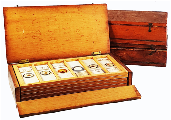 A picture containing text, wooden, wood, old
Description automatically generated